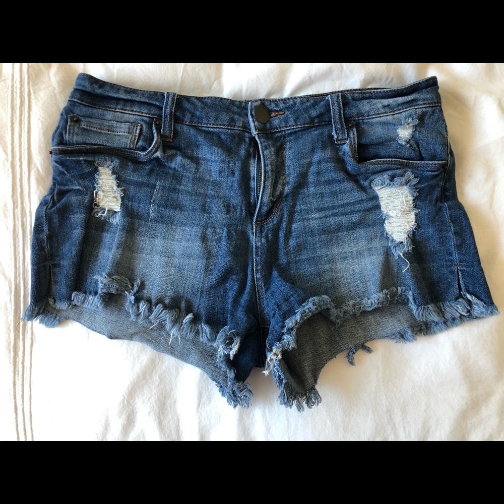 Distressed denim shorts